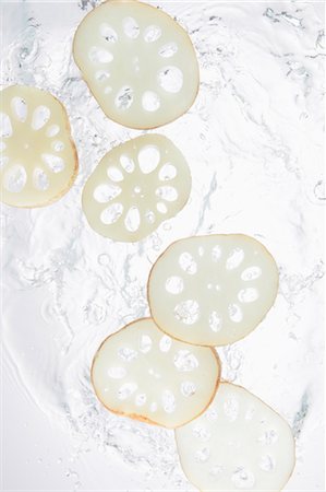 simsearch:859-03598694,k - Lotus Root Splashing In To Water Stock Photo - Rights-Managed, Code: 859-03598695