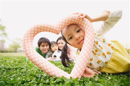 soccer grass kids - Family Enjoying in Park Stock Photo - Rights-Managed, Code: 859-03599180