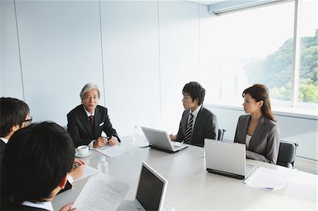 presentation people executive - Business Colleagues In A Meeting Foto de stock - Con derechos protegidos, Código: 859-03599361
