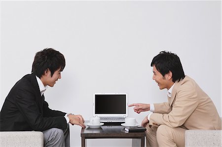 pictures of people meeting casually for drinks - Business Colleagues In A Meeting Stock Photo - Rights-Managed, Code: 859-03599387