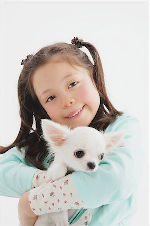 dog person white background - Chihuahua And Girl Stock Photo - Rights-Managed, Code: 859-03599510