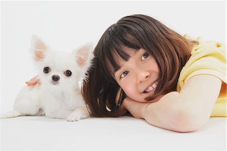 Chihuahua And Girl Stock Photo - Rights-Managed, Code: 859-03599513