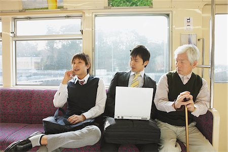 full body student holding laptop - Train Violation Stock Photo - Rights-Managed, Code: 859-03599598