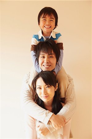 shoulder ride women on men - Family,Portrait Stock Photo - Rights-Managed, Code: 859-03599654