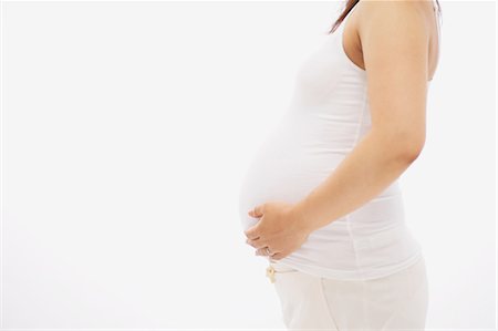 simsearch:859-03600091,k - Schwangere Frau ihren Bauch berühren Stockbilder - Lizenzpflichtiges, Bildnummer: 859-03600075