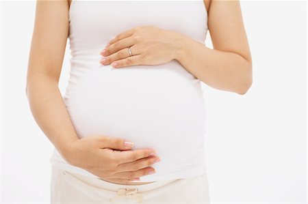 simsearch:859-03600068,k - Midsection of Pregnant Woman Fotografie stock - Rights-Managed, Codice: 859-03600076