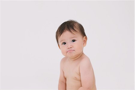 simsearch:859-03600167,k - Sitting Baby Foto de stock - Direito Controlado, Número: 859-03600210