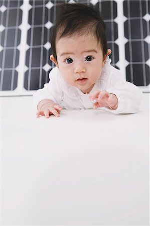 simsearch:859-03600176,k - Solar Panel And Baby Stock Photo - Rights-Managed, Code: 859-03600231