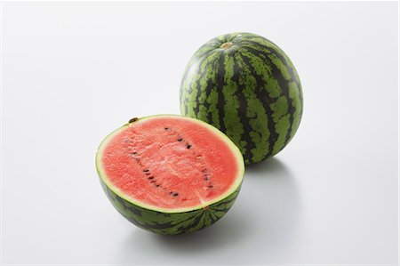 red watermelon - Half Sliced Watermelon Stock Photo - Rights-Managed, Code: 859-03600262