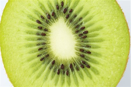 Slice of Nutritious Kiwi Fruit Foto de stock - Con derechos protegidos, Código: 859-03600292