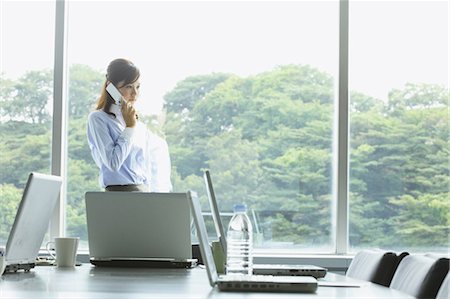 Businesswoman Talking On The Phone Stock Photo - Rights-Managed, Code: 859-03600307