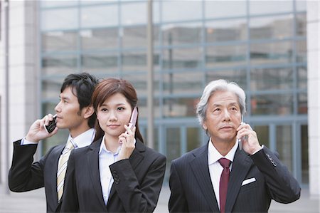 simsearch:859-03600374,k - Businessmen And BusinesswomanTalking On The Phone Stock Photo - Rights-Managed, Code: 859-03600374