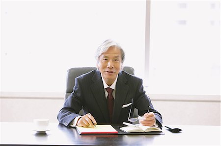 président (directeur) - Homme d'affaires exécutif Photographie de stock - Rights-Managed, Code: 859-03600403