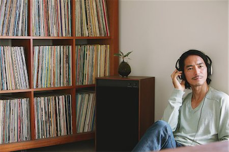 Man Listening Music Stock Photo - Rights-Managed, Code: 859-03600523