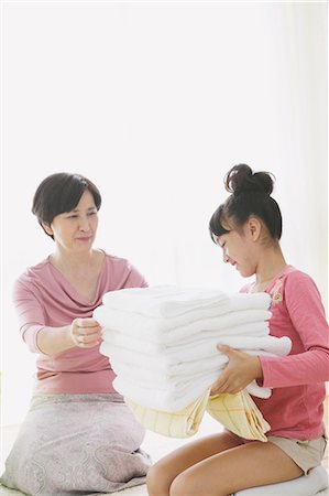 simsearch:859-03599629,k - Grandmother And Granddaughter With Laundry Stock Photo - Rights-Managed, Code: 859-03600694