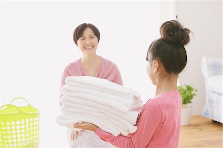 simsearch:859-03599629,k - Grandmother And Granddaughter With Laundry Stock Photo - Rights-Managed, Code: 859-03600699