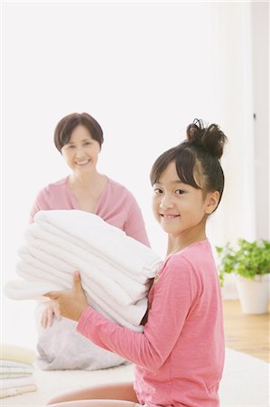 simsearch:859-03599629,k - Grandmother And Granddaughter With Laundry Stock Photo - Rights-Managed, Code: 859-03600700