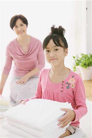 simsearch:859-03599629,k - Grandmother And Granddaughter With Laundry Stock Photo - Rights-Managed, Code: 859-03600701