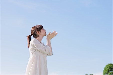 simsearch:859-03601258,k - Japanese Woman Raising Arms Stock Photo - Rights-Managed, Code: 859-03601259