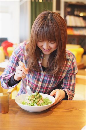 Woman Enjoying Lunch In Cafe Stock Photo - Rights-Managed, Code: 859-03730578