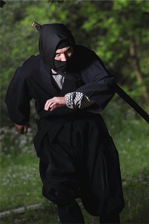 dark people running - Ninja Running Through Forest Stock Photo - Rights-Managed, Code: 859-03730714