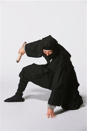 simsearch:859-03730741,k - Studio Shot of Ninja on White Background Foto de stock - Direito Controlado, Número: 859-03730737