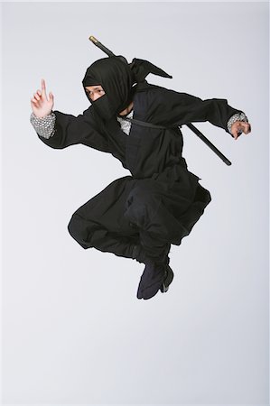 profile view asians - Ninja Leaping Stock Photo - Rights-Managed, Code: 859-03730766