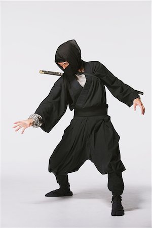 sword - Studio Shot of Ninja on White Background Stock Photo - Rights-Managed, Code: 859-03730775