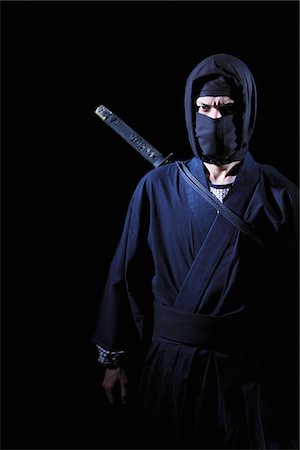 stealth fighter - Ninja With Black Background Foto de stock - Con derechos protegidos, Código: 859-03730797