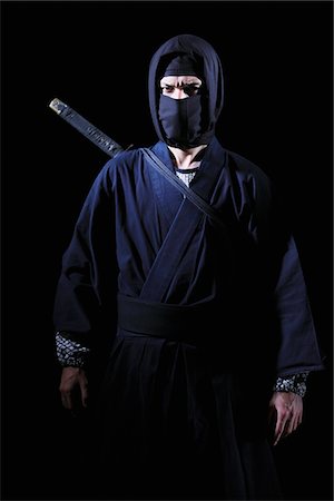 stealth fighter - Ninja With Black Background Foto de stock - Con derechos protegidos, Código: 859-03730804