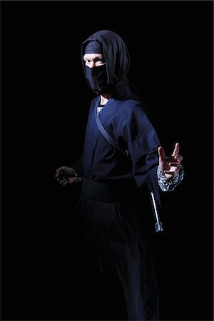 stealth fighter - Ninja With Black Background Stock Photo - Rights-Managed, Code: 859-03730805