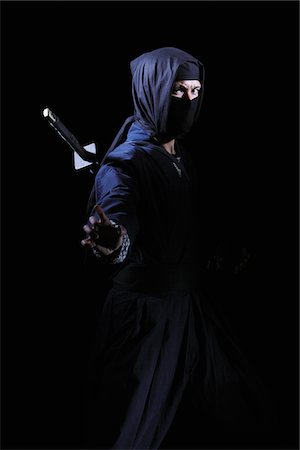 stealth fighter - Ninja With Black Background Foto de stock - Con derechos protegidos, Código: 859-03730806