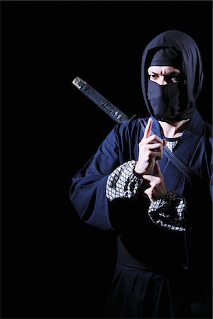stealth fighter - Ninja With Black Background Stock Photo - Rights-Managed, Code: 859-03730802