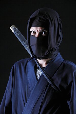 stealth fighter - Ninja With Black Background Foto de stock - Con derechos protegidos, Código: 859-03730813