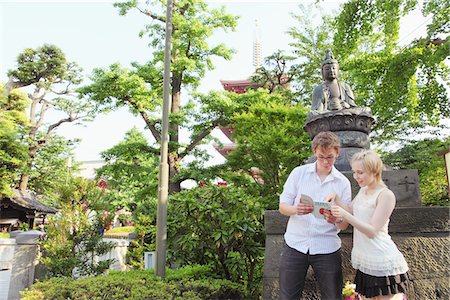 shinto - Young Couple Reading Guidebook Stock Photo - Rights-Managed, Code: 859-03730882