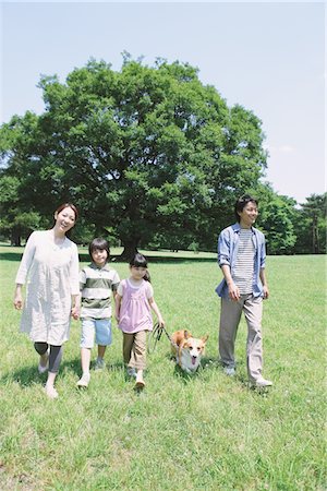 dog walk asian - Japanese Family Having Fun In a Park Stock Photo - Rights-Managed, Code: 859-03755353