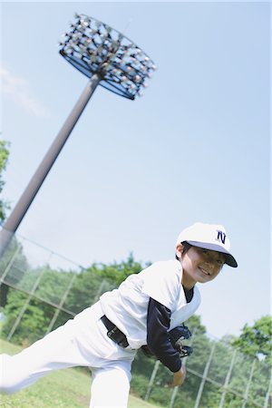 simsearch:693-03309303,k - Boy Playing Baseball Game Stock Photo - Rights-Managed, Code: 859-03755434