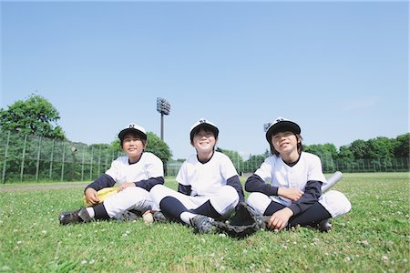 Baseball Friends Sitting In Playground Stock Photo - Rights-Managed, Code: 859-03755445