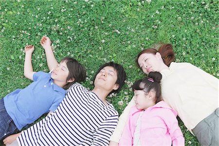 Family Sleeping In a Park Stock Photo - Rights-Managed, Code: 859-03755457