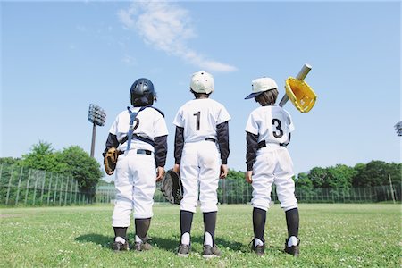 Joueurs de baseball dans le champ Photographie de stock - Rights-Managed, Code: 859-03755453