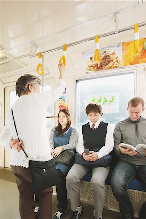 public transit - Passagers voyageant dans un train Photographie de stock - Rights-Managed, Code: 859-03755495