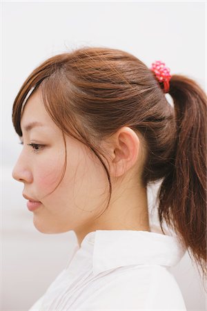 female ponytail side face - Portrait Of A Woman Stock Photo - Rights-Managed, Code: 859-03779894