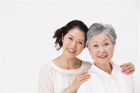 pretty gray hair smiling - Mother And Adult Daughter Together Stock Photo - Rights-Managed, Code: 859-03779996