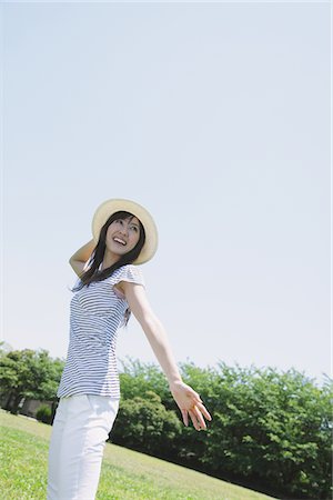 simsearch:859-03840420,k - Young Woman Having Fun In Park Stock Photo - Rights-Managed, Code: 859-03780137