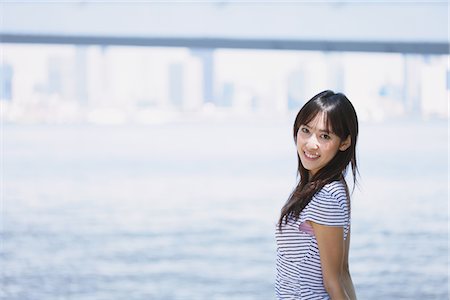simsearch:622-06190754,k - Young Woman Enjoying Near River Stock Photo - Rights-Managed, Code: 859-03780182