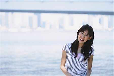 simsearch:622-06190754,k - Young Woman Enjoying Near River Stock Photo - Rights-Managed, Code: 859-03780183