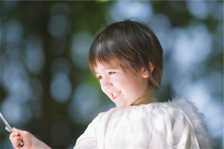 simsearch:859-03781985,k - Angel Boy Holding Magic Wand Foto de stock - Con derechos protegidos, Código: 859-03781911