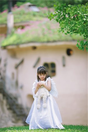 sad asian child - Upset Girl Holding Teddy Bear Stock Photo - Rights-Managed, Code: 859-03781940