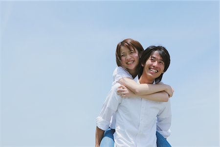 friend playing piggyback - Man giving Piggyback Ride to his Wife Stock Photo - Rights-Managed, Code: 859-03782017