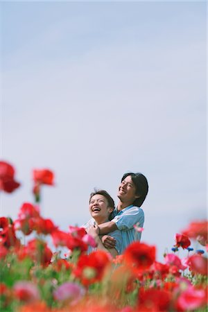 red lifestyle spring - Young Couple Smiling and Enjoying Together Stock Photo - Rights-Managed, Code: 859-03782054